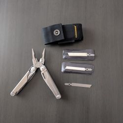Leatherman surge W/ Sheath And Extra Saw Blades And File