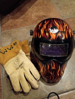 Welding helmet with gloves
