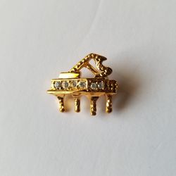 Gold And Rhinestoned Piano Pin