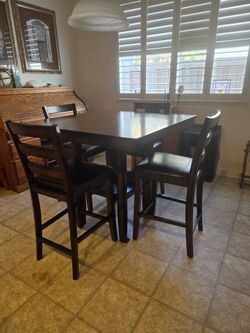 Pub table with 4 chairs
