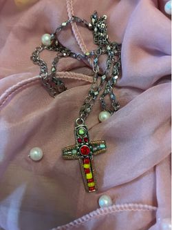 Cross with 16” Chain.      Not real silver.      South Austin.