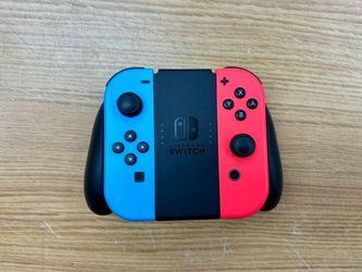 Nintendo Switch Joy-Con Controllers With Official Grip Neon Red/Blue Used