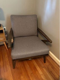 Arm chair - wood frame, firm gray cushions