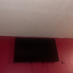 65 inch tv Roku (comes with remote)
