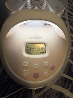 Spectra s2 breast pump and 3 sets of bottles
