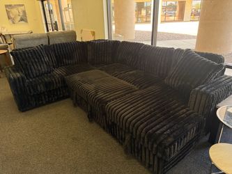 Large black Ribbed Sectional Sofa with sleeper
