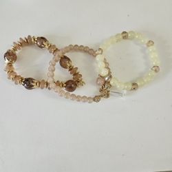 Set of three elastic beaded multicolored/styled bracelets, 6.5-7". EUC
