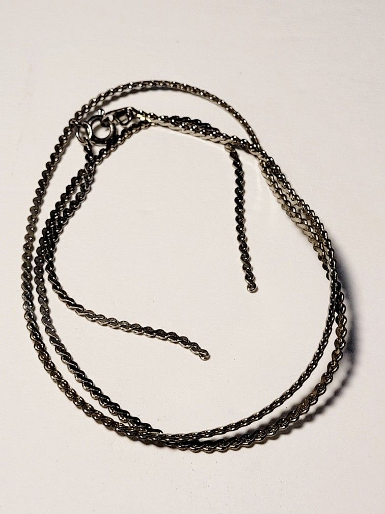 Vintage 18" Silver-toned Rope Chain Necklace Signed Korea ( BROKEN/ FOR REPAIR ONLY) The chain appears to be a silver-toned twisted rope chain necklac