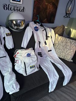 Two NASA costumes and backpack and helmet