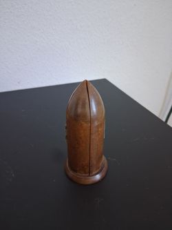 Antique Wooden Bullet-Shaped Box with hand crafted figurine inside