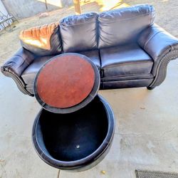 Charcoal Brown Leather Sofa With Mactching Leather Ottoman And Fireplace 