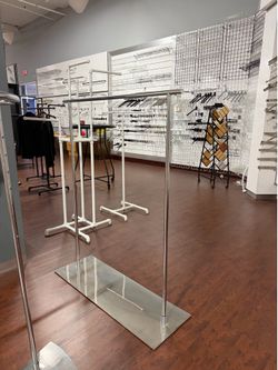 9 clothing racks, $200 each or $1500 for all 9, willing to negotiate
