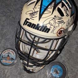 San Jose Sharks Autographed Helmet And Pucks