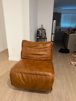 Tan Leather Armless Lounge Chair