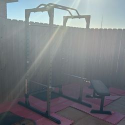 Gym Cage With Barbell And Plates