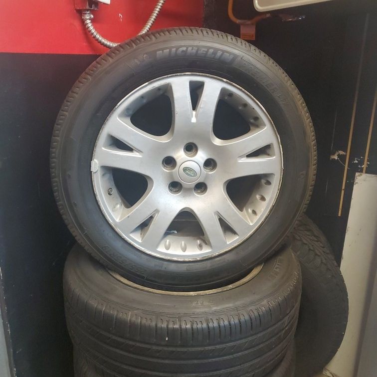 Four Range Rover rims and tires