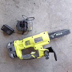 RYOBI CHAIN SAW WITH BATERY AND CHARGER ALMOST NEW 