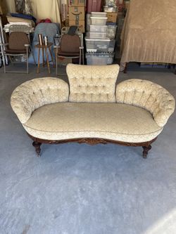 Antique Tufted Loveseat