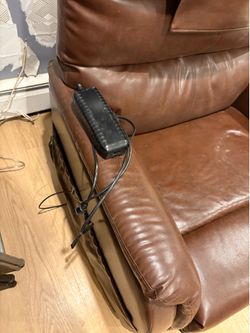 Recliner rocker, leather automatic going up to standing position brand new paid $1200 looking for 500 negotiable looking to get rid of immediately. It