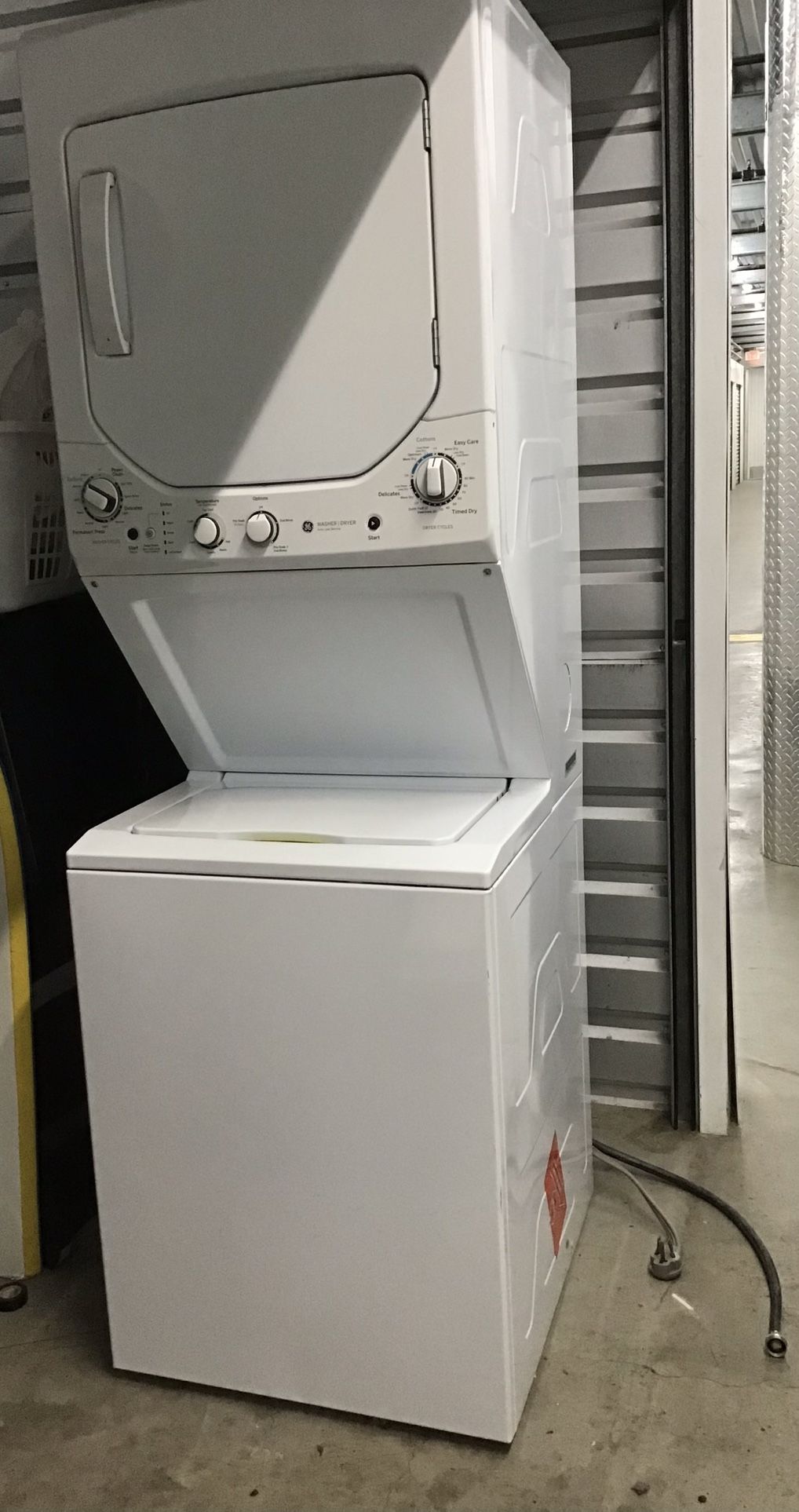 GE Washer/Dryer Model: GUD24ESSJWW