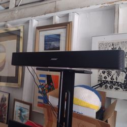 roll around computer or tv stand with bose speaker 