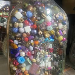 Large Glass Container full Of Beautiful Beads