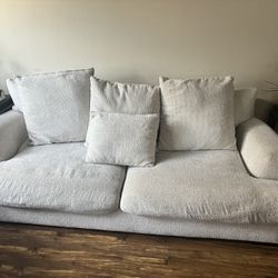 White Couch With Two Large Cushions 