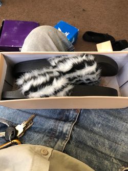 Brand new yolk flip flops asking twenty I have two pair 8.5 and 8 never been wore bought it for my wife and my sisters-in-law one can fit them never