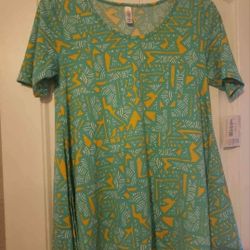New size small Lula Roe Top
💚💛