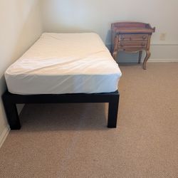 Black Metal Twin Bed With Rolling Trundle 