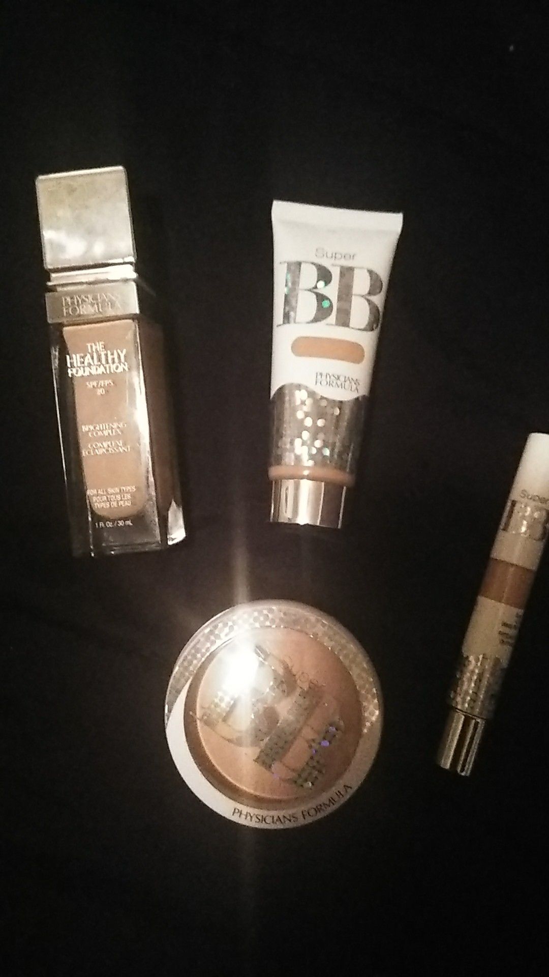 Physicians formula spf 20 foundation. Concealer. All in one beauty ball cream. And powder so light to medium