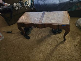 Provincial style marble-top coffee table.