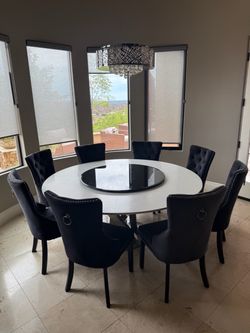 71" round Dining Table with 8 black velvet chairs