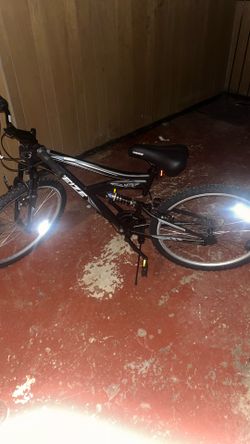 WEIZE dual-suspension mountain bike.