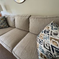 Raymour & Flanigan Tan Sofa With New Pillows 