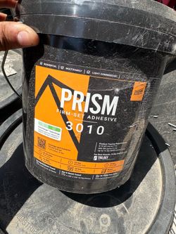Vinyl plank adhesive