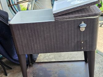Outdoor hip tall cooler opens from the top