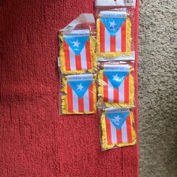New.  Puerto Rico flag one of your car window.