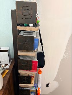 Southwest-style rustic metal and stone CD storage tower