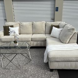 Sectional/couch/sofa, size: 115x92, Brand: Ashley Furniture, Color: Light beige, Delivery Available