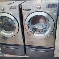 LG PLATINUM STEAM WASHER AND ELECTRIC STEAM DRYER SUPERCAPACITY WITH PEDESTALS