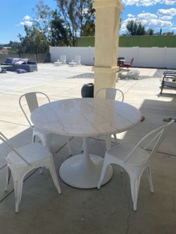 Marble top table and 4 metal chairs