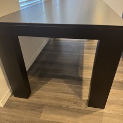 New black dining table