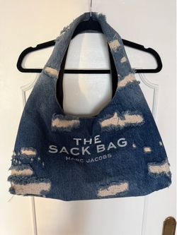 MARC JACOBS "The Sack Bag" in distressed, rip-and-repair denim. Blue 16in