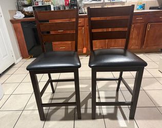 Par de sillas altas las 2 por $50