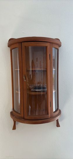 small wood and glass curio cabinet