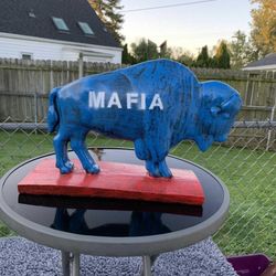 Buffalo statues sold separately