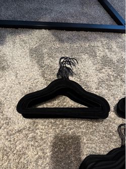 88 black velvet hangers for children’s clothing
