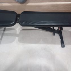 Workout Bench And Some Weights 