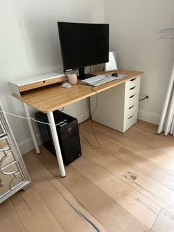 White and wood IKEA desk
